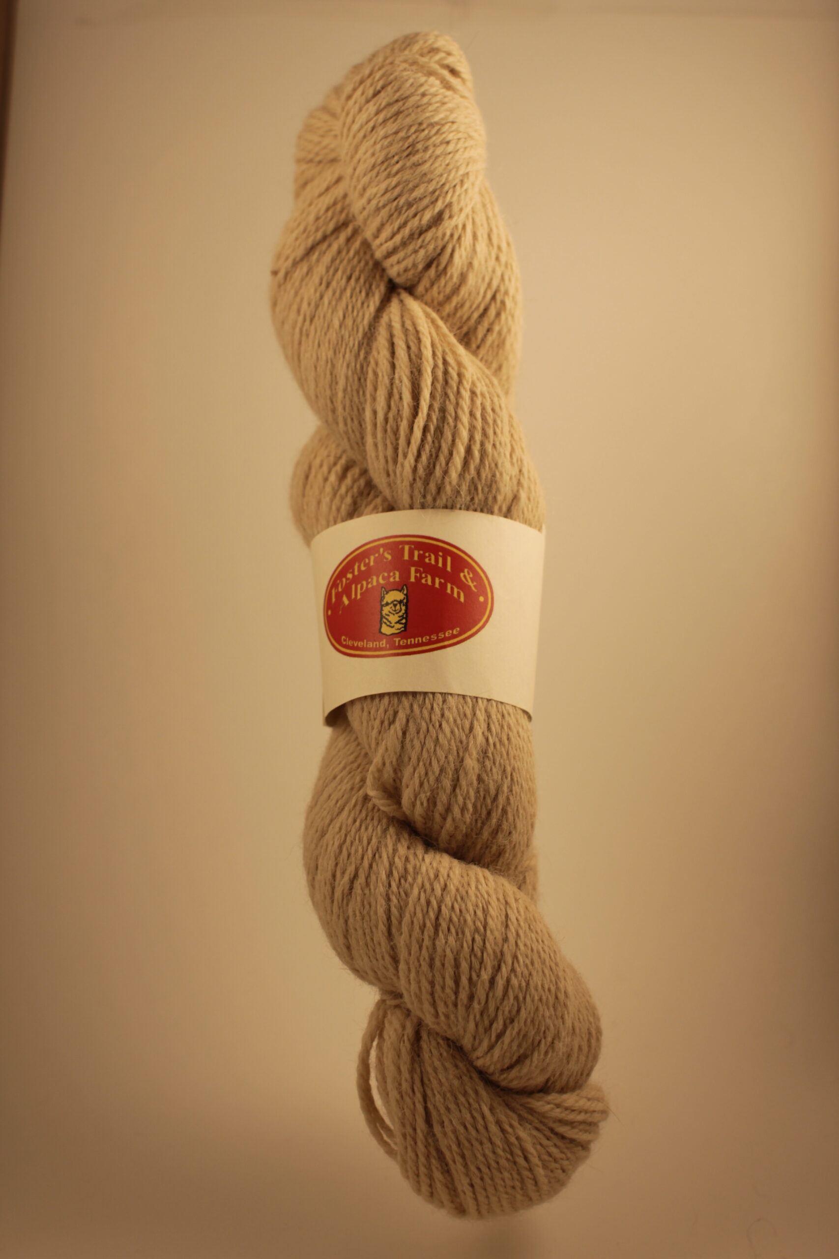 Burly wood colored alpaca yarn skein from the alpaca Miracle Belle. From Foster's Trail and Alpaca Farm in Cleveland, Tennessee